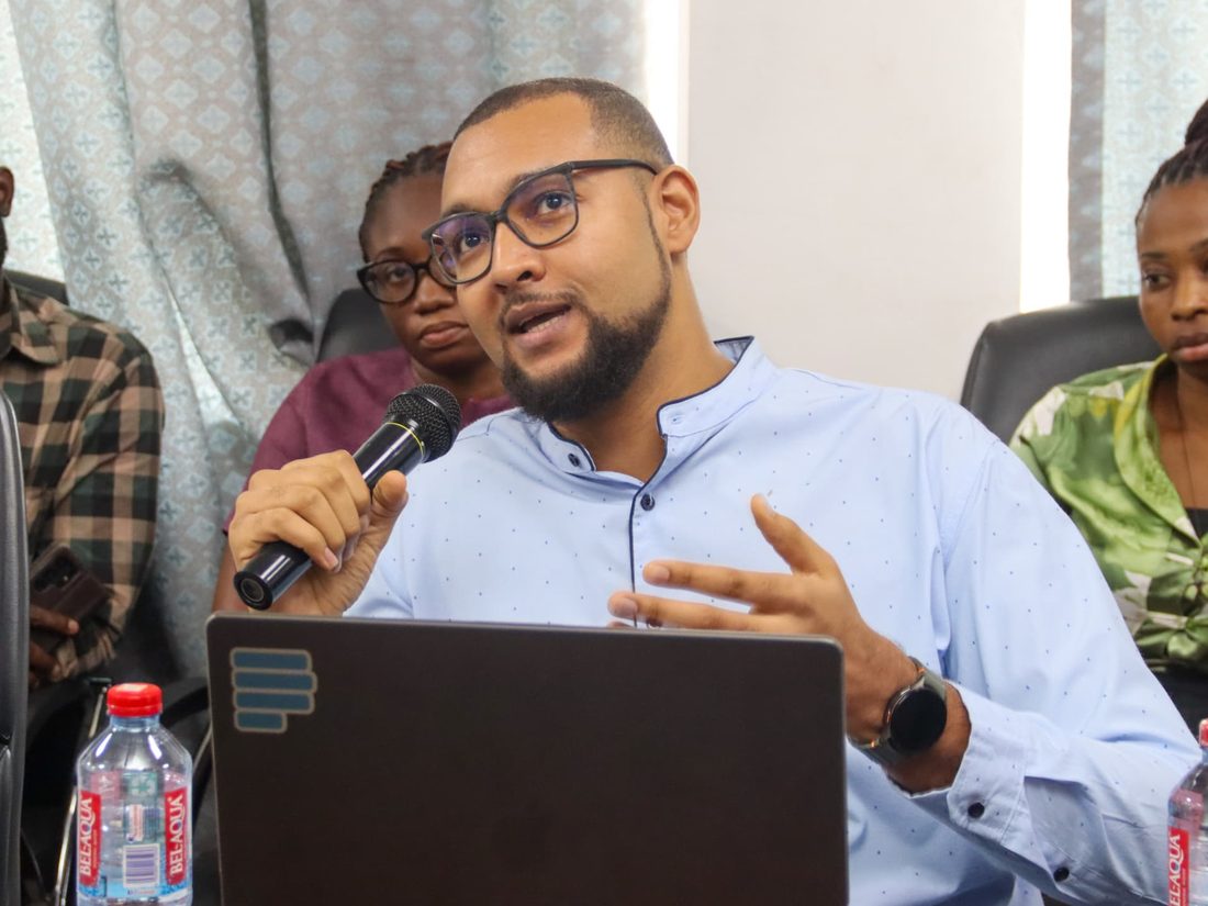 A
      MulticomIoT engineer answering a question during a briefing